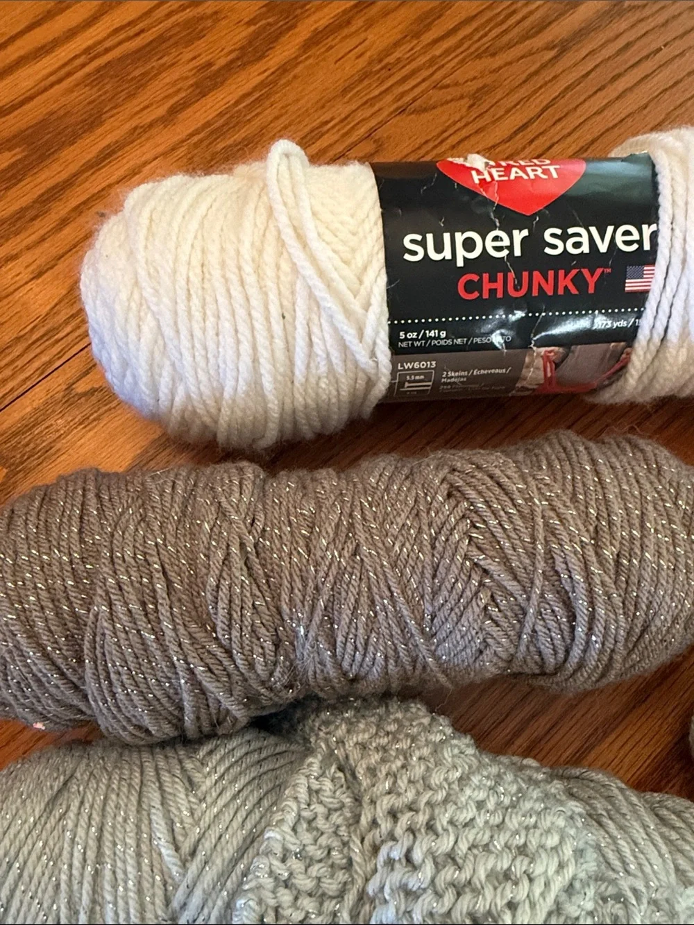 Super Saver Yarn Bundle in Purple, Black, white, gray metallic, and brown.